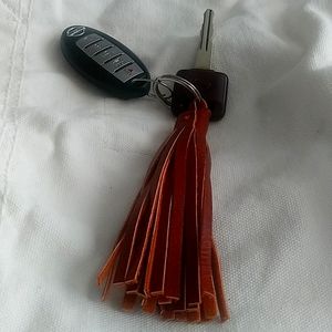 Leather Tassel Designer key chain holder 1Sz$28 +  free hat or scarf .